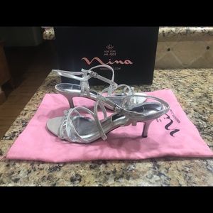 Pair of silver Nina shoes